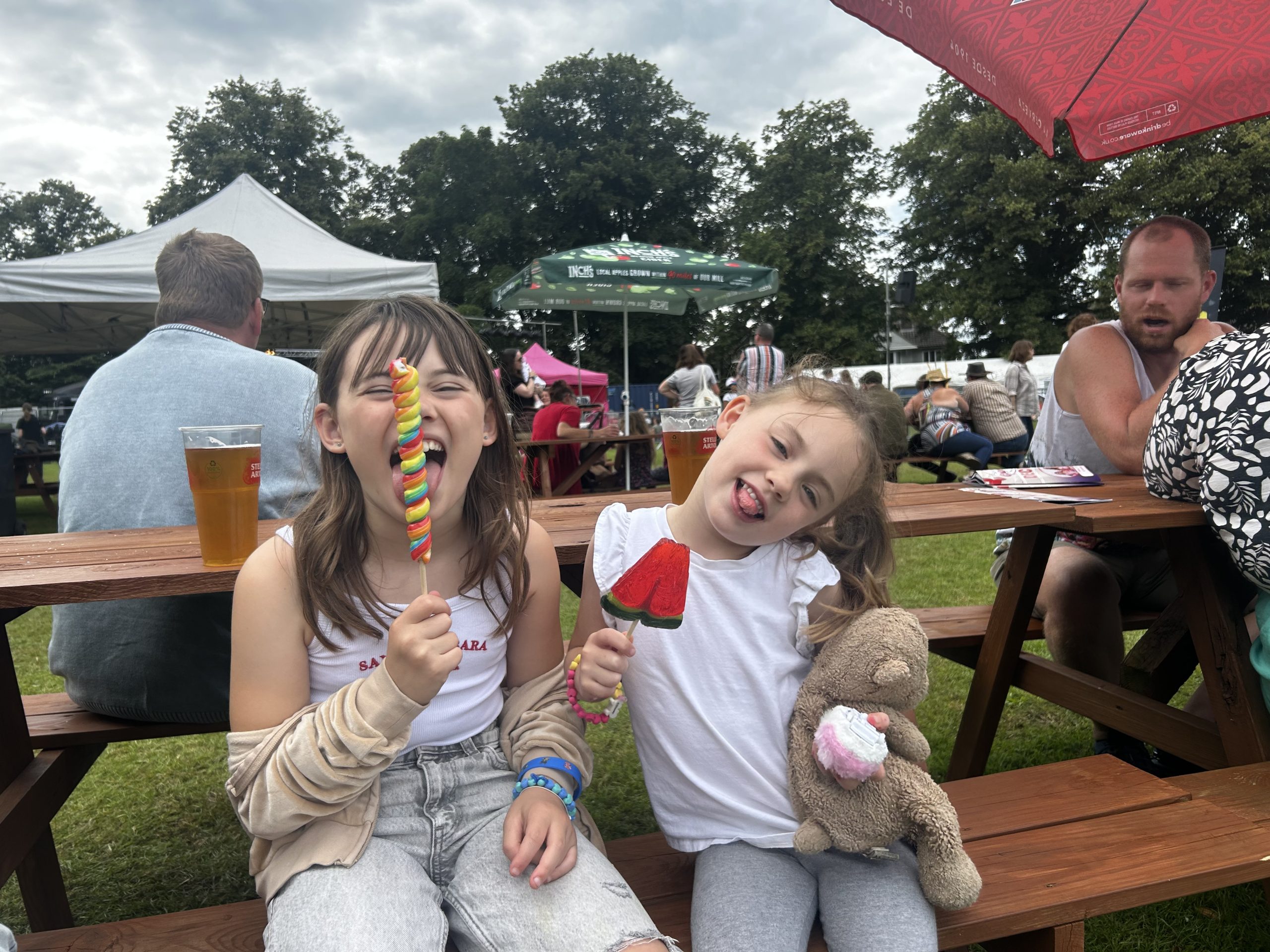 Two girls eat lollies in Stowmarket 