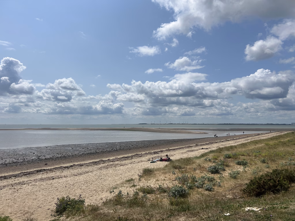 The beach view from the best family friendly campsite in Essex with a poll